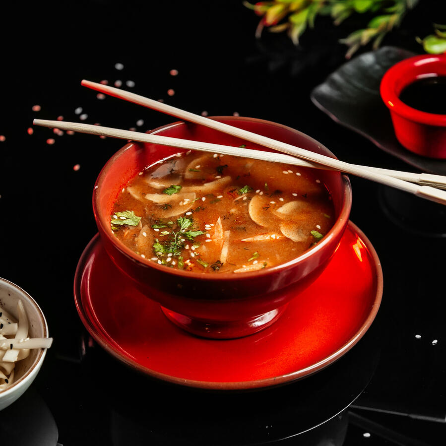 Miso Soup A Far Eastern staple, often eaten multiple times a day, this soup is made by mixing miso paste with light fish stock. Bite-sized cubes of tofu are added near the end of preparation to ensure the pieces retain their shape.