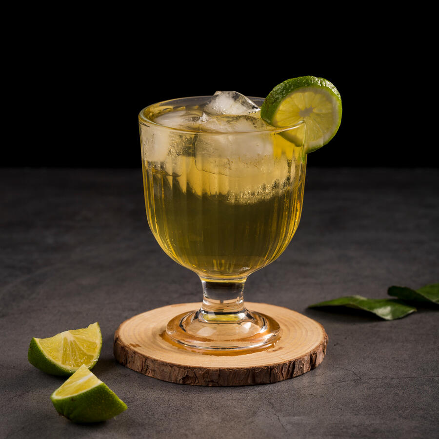 Domo Arigato Mezcal, simple syrup, lime juice, ginger, sesame, and club soda.